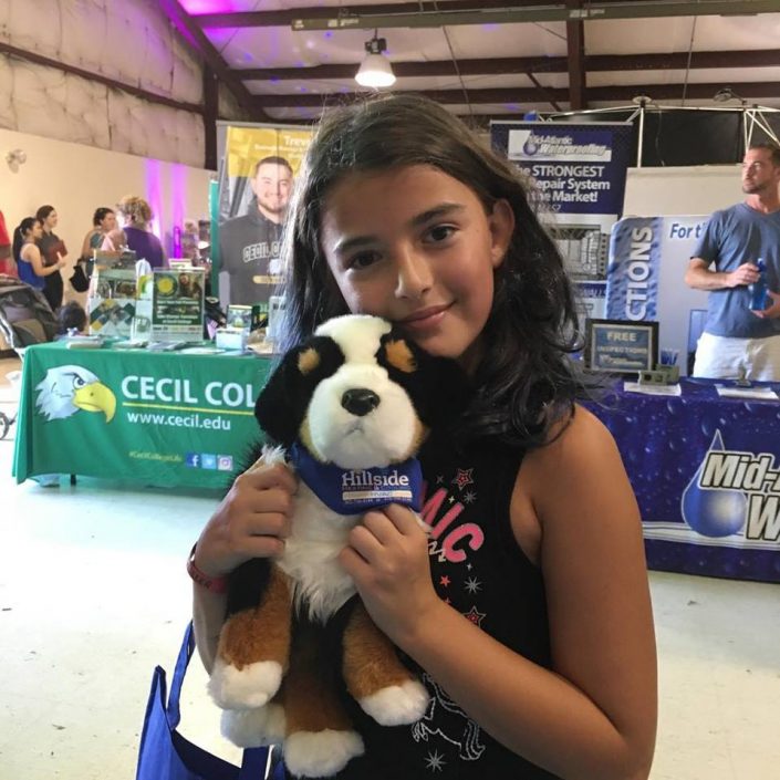 beautiful young girl is winner of Hillside HVAC "Super Secret Winner" at the 2018 Cecil County Fair